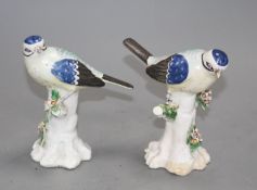 A pair of Derby figures of blue tits on tree stumps, c.1765-70, height 11.7cm and 11.5cm Note: Ex