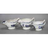 A Lowestoft blue and white sauceboat, c.1770 and two Worcester blue and white sauceboats, c.1758-65,