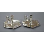 A pair of late Victorian silver hexagonal chambersticks, maker's mark rubbed, London, 1897, width