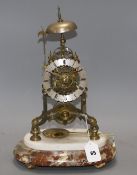 A Victorian brass skeleton timepiece, height 35cm, overall height 42cm Condition: Looks to be in