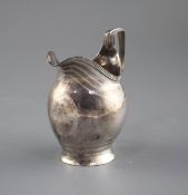 A George III engraved silver helmet shaped cream jug by George Burrows, London, 1799, height 11cm,