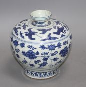 A Chinese blue and white bulbous vase, Ming, with restored rim, height 19cm Condition: Rim from
