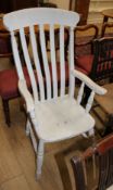 A Victorian painted pine and beech Windsor lathe back chair Condition: Joints a little wobbly, paint