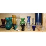 Seven Edwardian coloured glass hyacinth vases, a slender specimen vase and a thirteen other