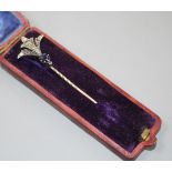 An early 20th century yellow and white metal, sapphire and diamond set stick pin, 62mm, gross weight