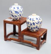 Two Chinese crackleglaze small blue and white vases, painted with figures, late 19th century plus