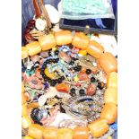 A group of assorted costume jewellery and watches etc.