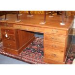 A mahogany pedestal desk, W.151cm D.91cm H.80cm Condition: Of fairly even gingery brown colour