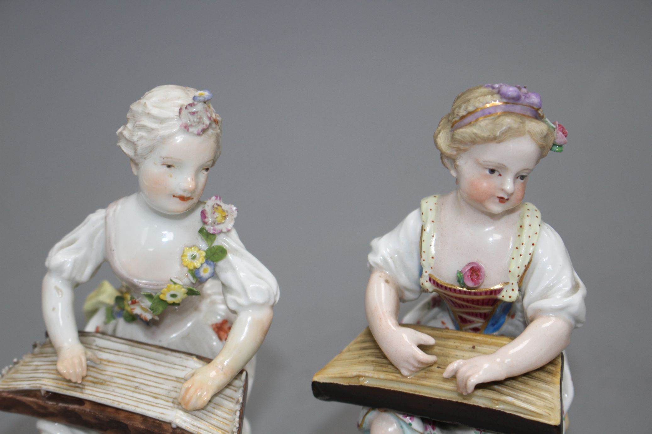 An 18th century Meissen figure of a girl playing a zither and a 19th century Meissen figure of a - Image 4 of 6