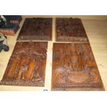 A set of four 19th century Continental relief carved oak religious plaques, depicting biblical
