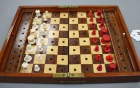 A late 19th century Jaques, London Travelling 'In Statu Quo' travelling chess set, the folding