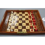 A late 19th century Jaques, London Travelling 'In Statu Quo' travelling chess set, the folding