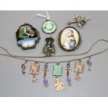 A white metal and enamel locket, a gilt metal and enamel necklace, two pendants, a brooch and 830