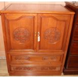 A Chinese padouk wood cabinet, W.90cm Condition: Of typical gingery red tone, possibly slightly