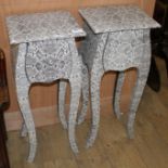 A pair of simulated snakeskin covered bedside tables, each with single drawer, W.34cm D.28cm H.