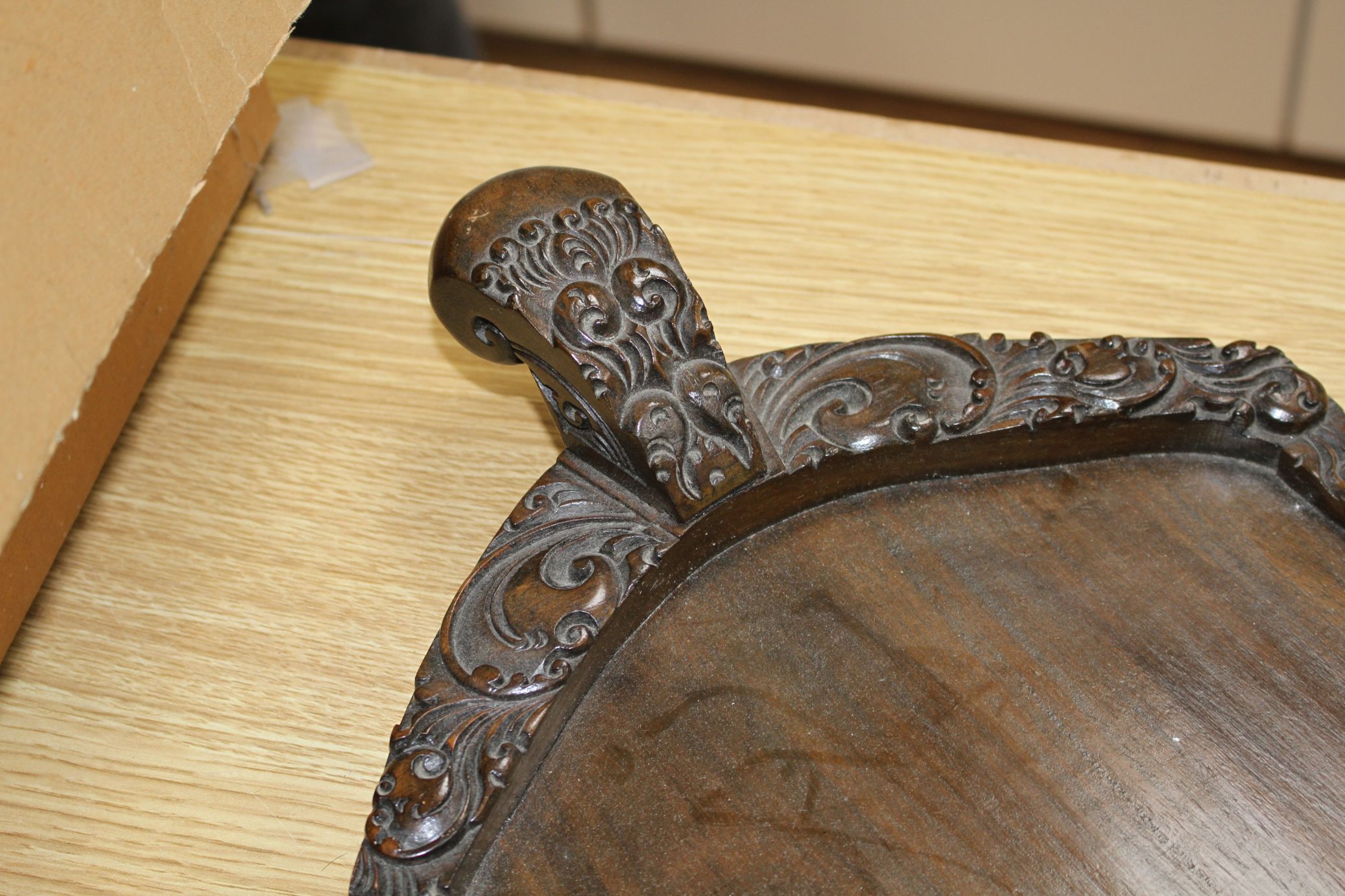 A Burmese carved hardwood tray, 70cm Condition: In good condition, minor scuffing to underside - Image 3 of 4