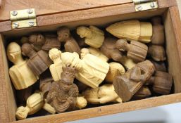 An East African carved wood chess set, kings 5cm, in carved hardwood box, possibly from The