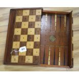 A Victorian mahogany folding games box, the interior marked for backgammon, the outer surface inlaid