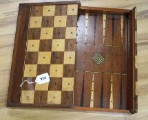 A Victorian mahogany folding games box, the interior marked for backgammon, the outer surface inlaid