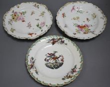 A Chelsea gold anchor 'bird and insect' plate and a similar pair of floral plates, c. 1765, 22 and