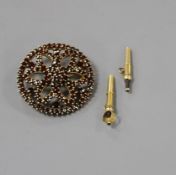 A Victorian pierced yellow metal and garnet set cluster brooch and two watch keys. Condition: Brooch