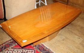 A satin maple coffee table, L.150cm D.81cm H.41cm Condition: Very good clean condition