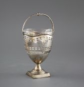 An Edwardian pierced silver sugar basket by William Aitken, Birmingham, 1908, height excluding