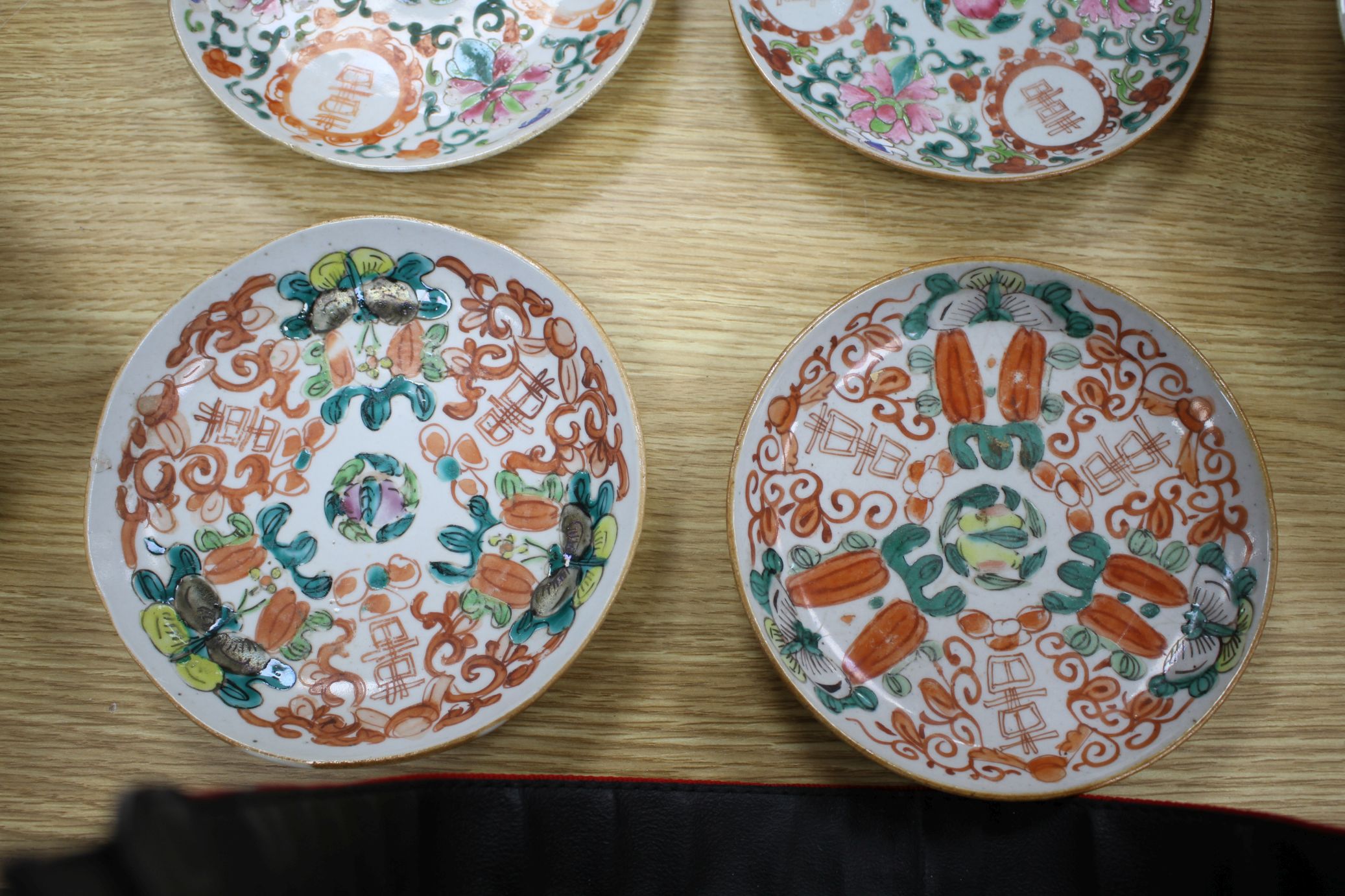 A near set of six 19th century Chinese famille rose saucer dishes, each painted with fruit and - Image 4 of 6