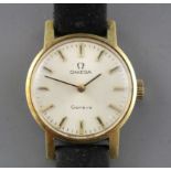 A lady's steel and gold plated Omega manual wind wrist watch, on associated leather strap.