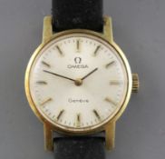 A lady's steel and gold plated Omega manual wind wrist watch, on associated leather strap.