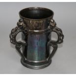 A Dickerware black lustre three handed tyg, early 20th century, indistinct impressed mark, height