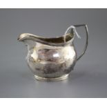 A George III silver helmet shaped cream jug, by Charles Hougham?, London, 1806, height, 85mm, 3oz.