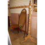 A large turned pine coat rack, W.180cm H.190cm Condition: Looks to be in good clean condition,