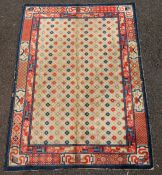 A small Chinese Suiyvan carpet, the fawn ground field woven with a lattice pattern, each cross