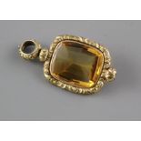 A Victorian yellow metal overlaid citrine fob pendant, overall 46mm, Condition:- Wear to the metal