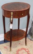 A pair of Louis XVI style oval two tier occasional tables, W.45cm Condition: Both with some very