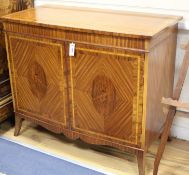 A George III style satinwood and rosewood bowfront side cabinet, W.108cm, D.55cm H.91.5cm Condition: