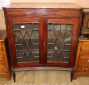 A mahogany concave front display cabinet, W.102cm D.47cm H.120cm Condition: Good rich dark