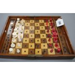 A late 19th century Jaques , London Travelling 'In Statu Quo' travelling chess set, the folding