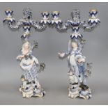 A pair of Meissen porcelain candelabra, modelled with lady and gallant stems, height 46cm Condition: