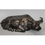 A Chinese black glazed pottery model of a seated water buffalo, length 56cm Condition: Tips of
