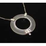 An Art Deco style paste mounted frosted glass? pendant necklace, marked '925', pendant 63mm,