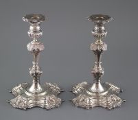 A pair of modern 18th century style Irish cast silver candlesticks, by Royal Irish Silver Co.