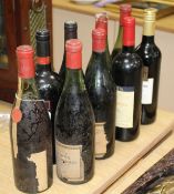 Nine assorted bottles of wine: Burgundy with no label, J. Mommessia to the cap; Badgers Creek Shiraz