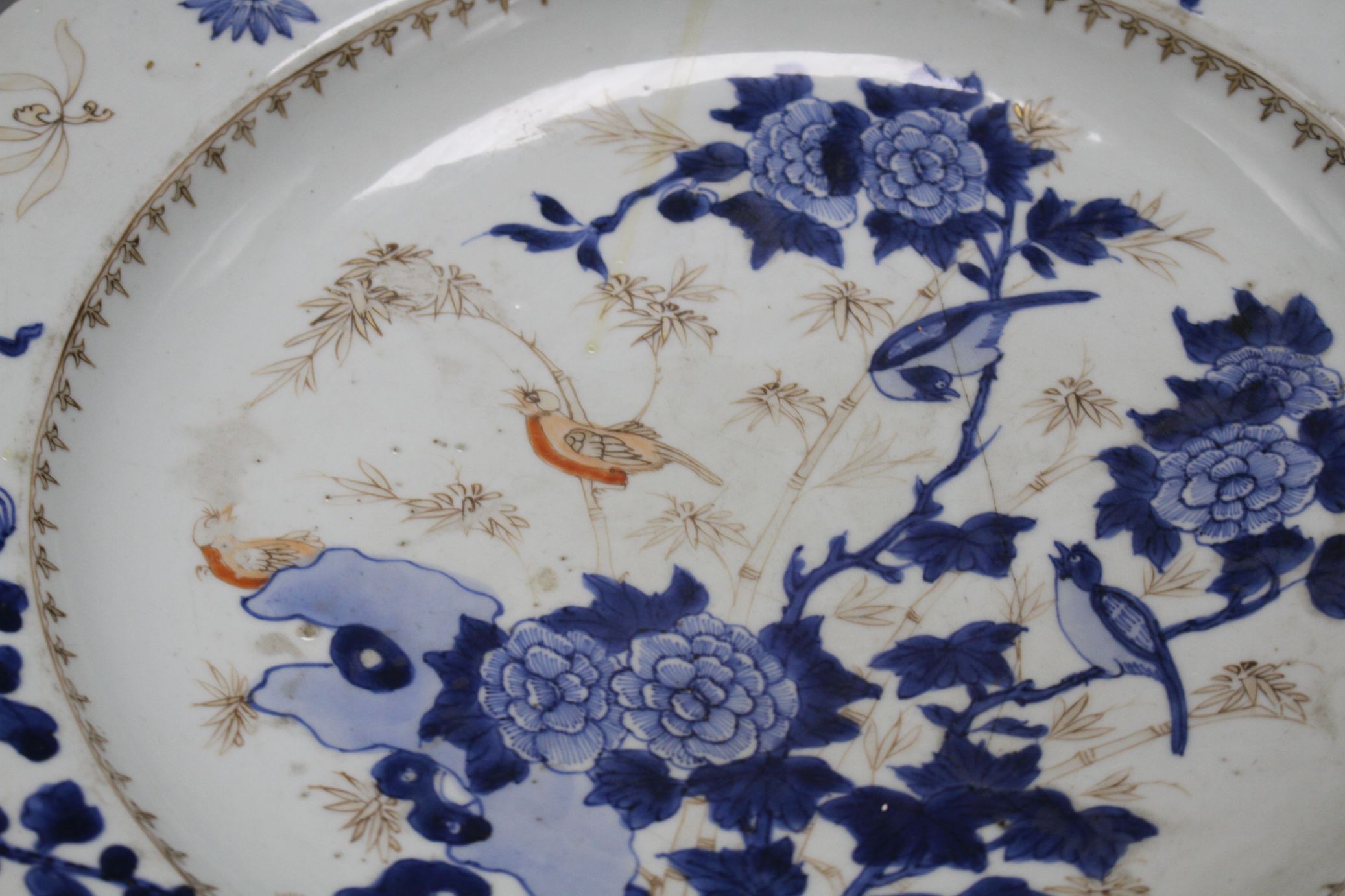 A Chinese grisaille and underglaze blue dish, c.1740, decorated with birds, bamboo, rocks and - Image 2 of 8