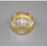 A 1970's 18ct gold wedding band, size M, 11.1 grams, Condition: Minor surface scratches in