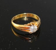 A George V 18ct gold and claw set solitaire diamond ring, diameter of stone is approximately 6mm,