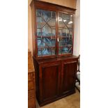 A Victorian mahogany bookcase / cupboard, W.96cm Condition: Dark reddish brown mahogany tone in fair