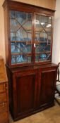 A Victorian mahogany bookcase / cupboard, W.96cm Condition: Dark reddish brown mahogany tone in fair