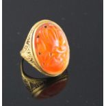 A 14k filigree yellow metal and orange chalcedony set dress ring, carved with fruit, size M, gross